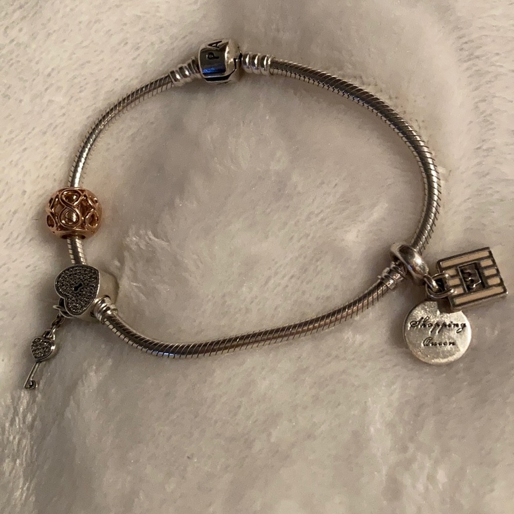 Authentic Pandora bracelet with authentic Charms - Picture 2 of 5